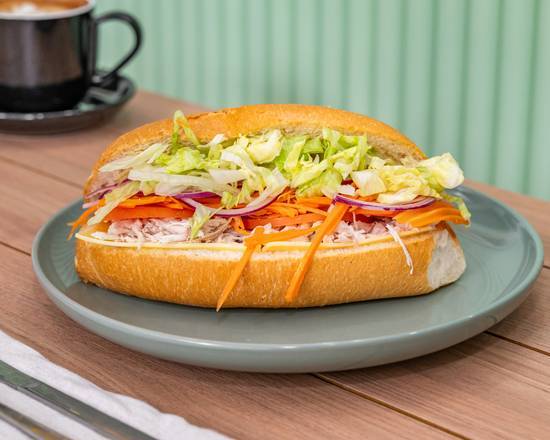 Special combo — ham salad roll with a 600ml water or any 375ml can, $12
