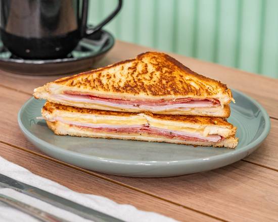 Breakfast specials — ham & cheese toastie and egg & bacon roll with a coffee or hot chocolate